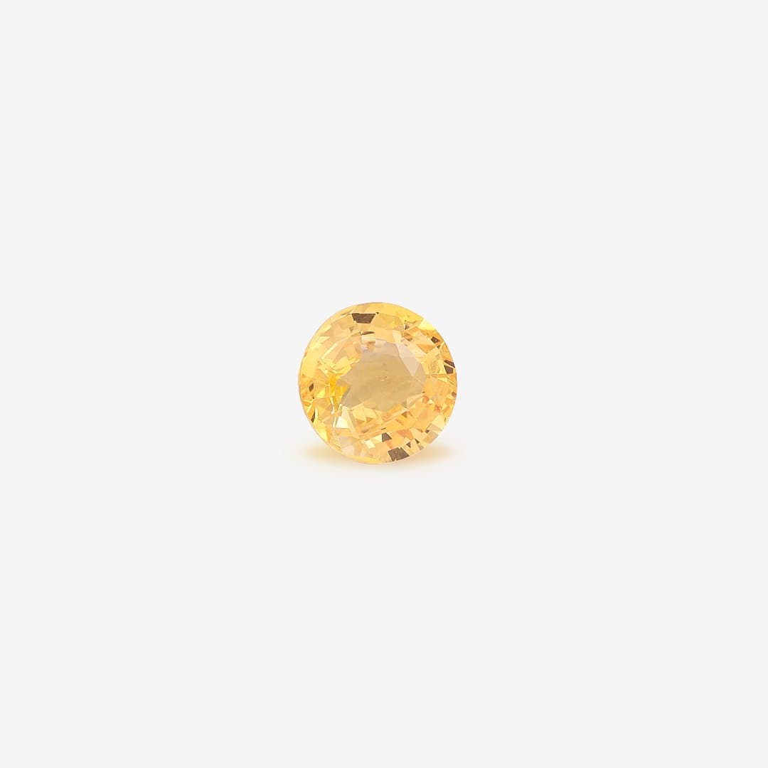 Round-cut orange sapphire