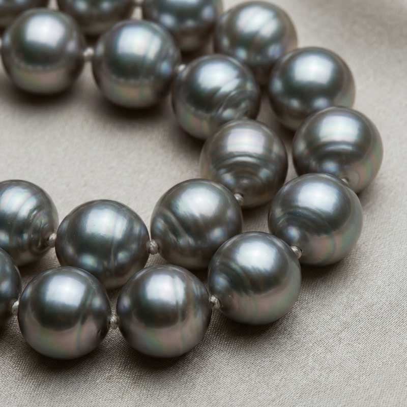 Close-up of South Sea pearl showing mirror-like nacre luster and organic layering