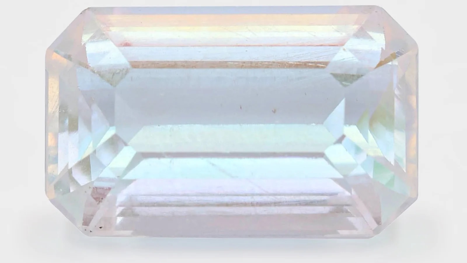 Faceted rainbow moonstone, emerald cut, 8.72 carats, from the Joalys collection