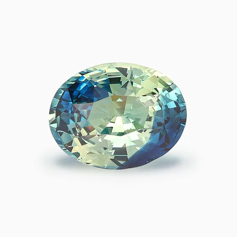 Loose parti-colored sapphire, blue and yellow, oval cut, 1.66 ct, on a white ground