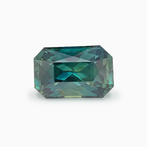 Loose teal sapphire, octagonal cut, 1.61 ct, on a white ground