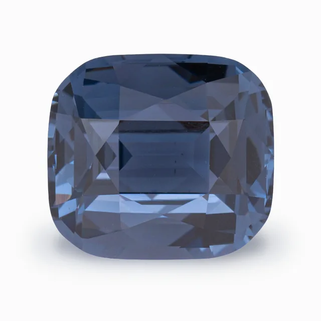 Loose spinel, grayish blue, cushion cut, 4.12 ct, on a white ground