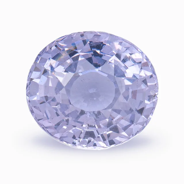 Loose spinel, pale lavender, oval cut, 3.04 ct, on a white ground