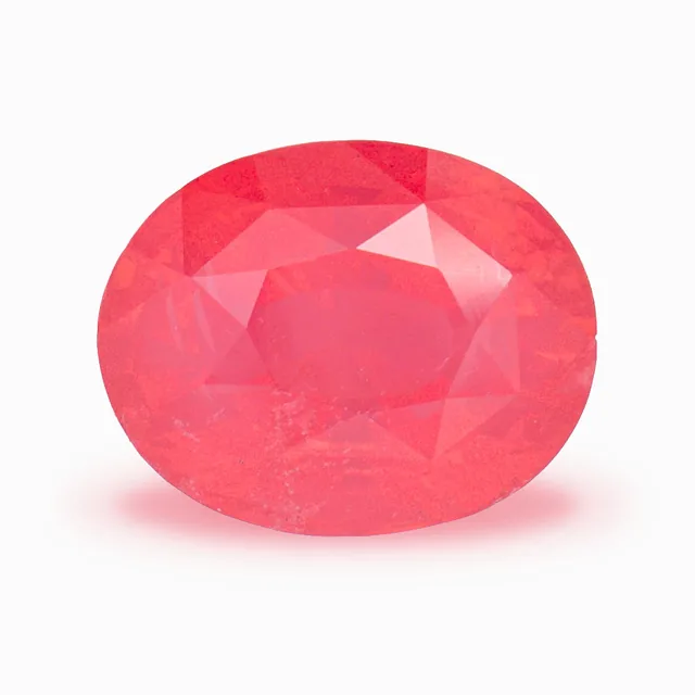 Loose spinel, reddish orange, oval cut, 3.05 ct, on a white ground