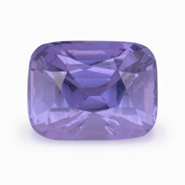 Loose spinel, purple, cushion cut, 4.10 ct, on a white ground