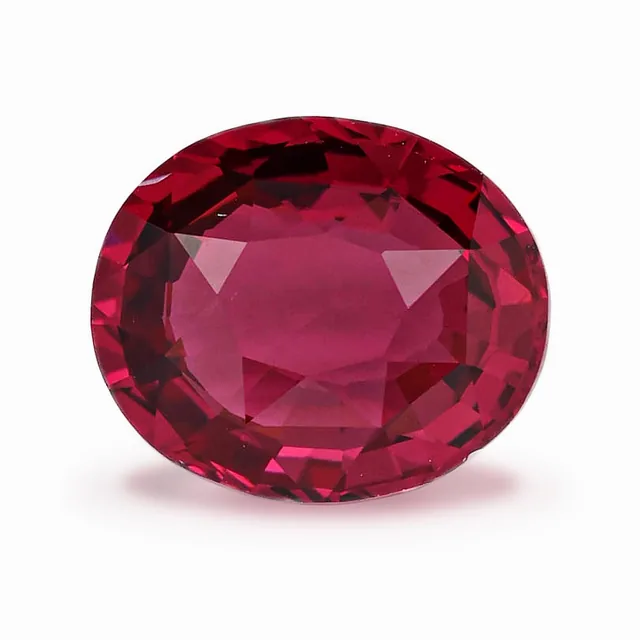 Loose spinel, deep purplish pink, close to red, oval cut, 2.64 ct, on a white ground