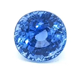 Blue sapphire, 3.04 ct, round cut. 7.65 by 7.44 mm across, 6.2 mm deep. Turn it on its side.
