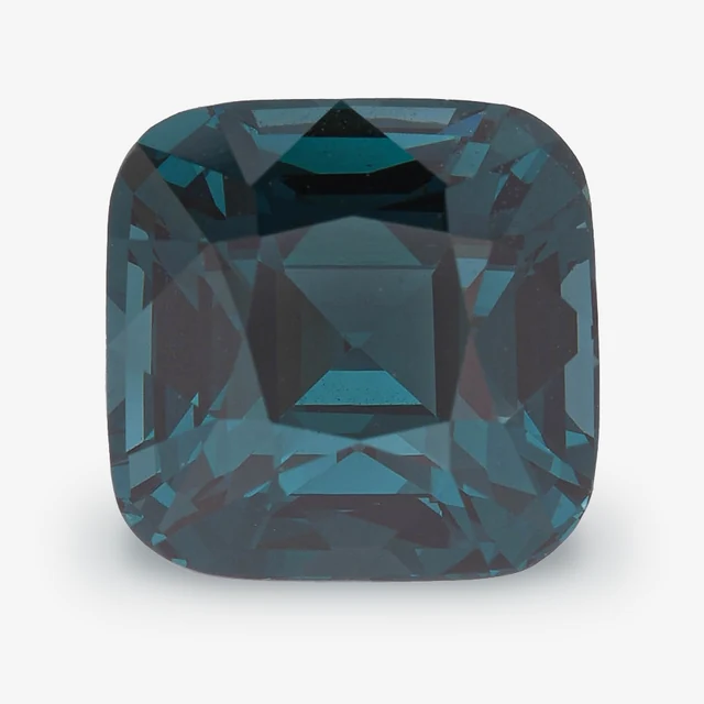 Loose spinel listed as deep greenish blue, 4.15 ct, cushion cut